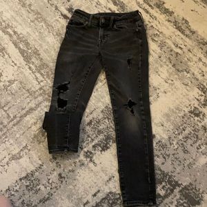 Nice pair of American Eagle skinny jeans black and distressed.